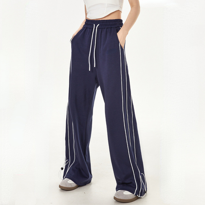 Pantalón deportivo holgado con cintura alta y perneras rectas