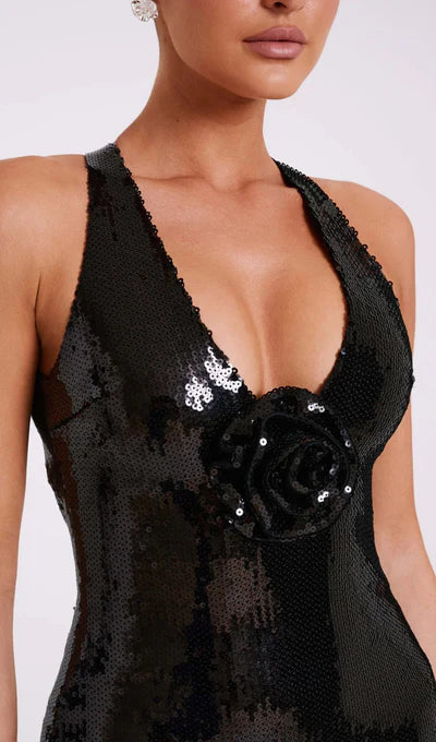 Vestido largo de lentejuelas con símbolo de rosas