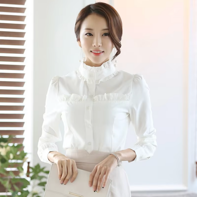 Evalyn – Elegante blusa de algodón con cuello alto